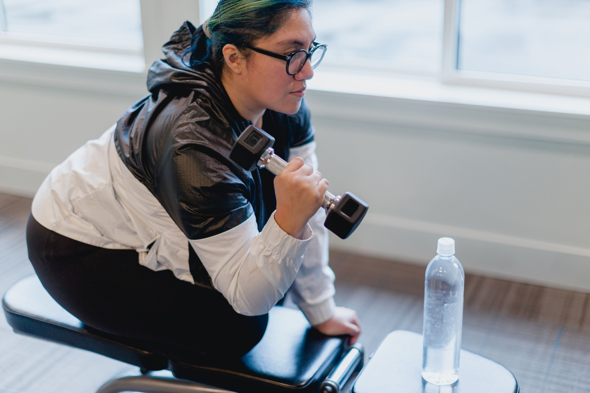 Motivated Woman Working Out in Gym
